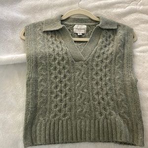 Green sweater vest